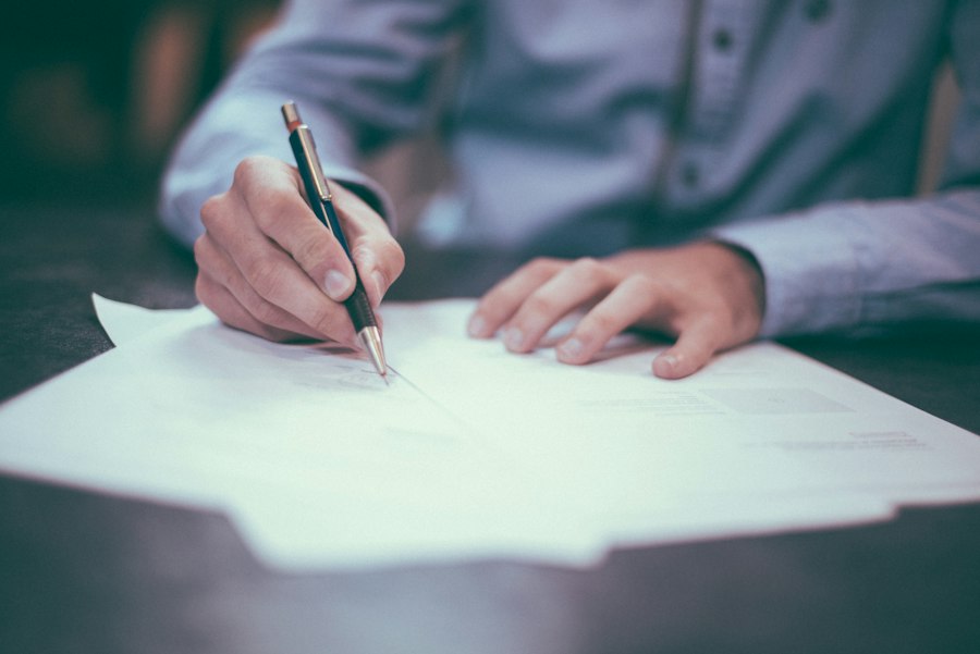 Financial documents being reviewed at a desk